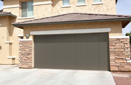 Puerta Automática de Garaje Seccional - Maguisa Gandía con Apertura Lateral